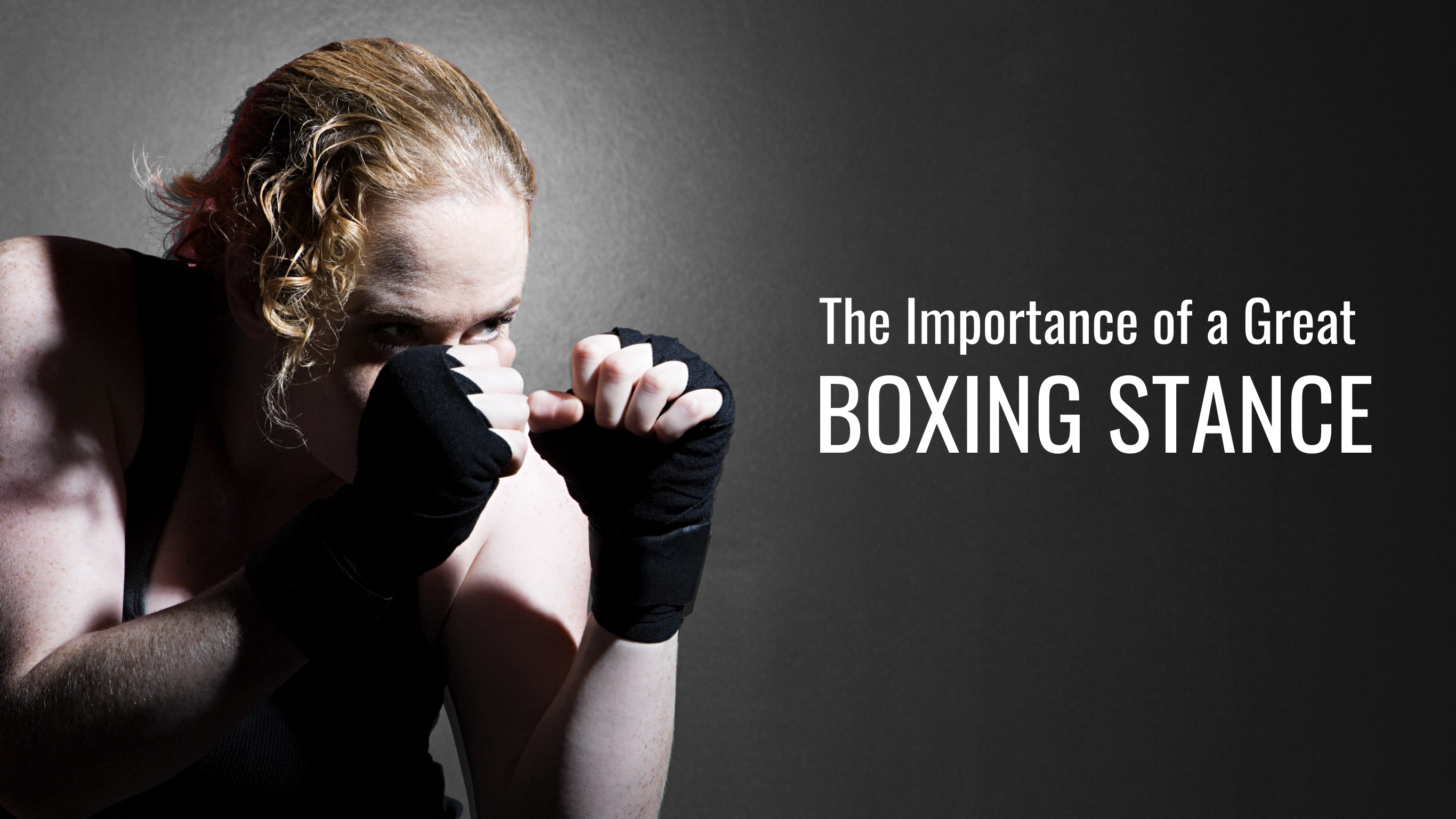 Woman in boxing stance with fists up, demonstrating correct form for beginner boxing technique